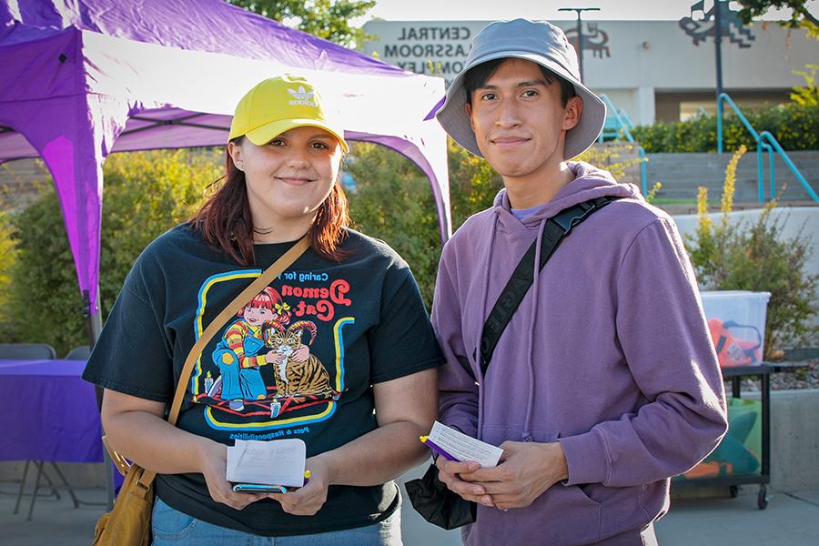 Two students standing together